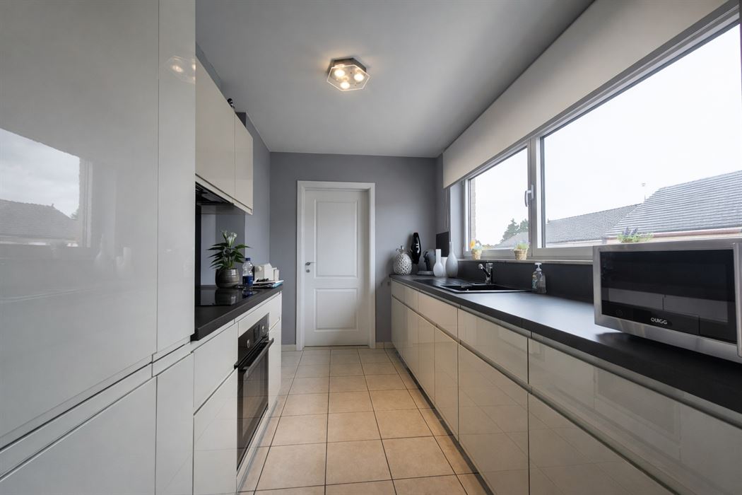 Instapklaar duplex appartement met terras en ondergrondse garage op steenworp van Hasselt centrum