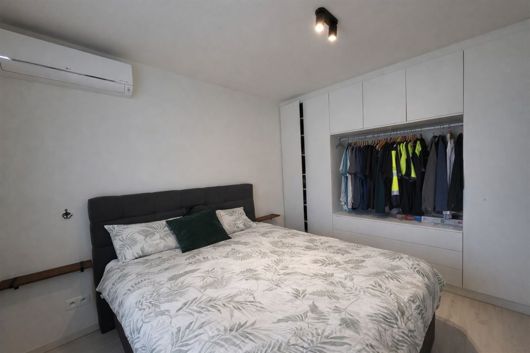 Prachtig luxueus appartement met terras, ondergrondse garage en hoogwaardige technieken op topligging nabij het centrum van Genk