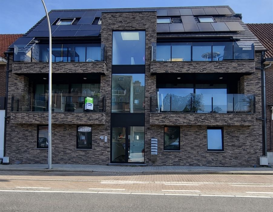 Prachtig luxueus appartement met terras, ondergrondse garage en hoogwaardige technieken op topligging nabij het centrum van Genk