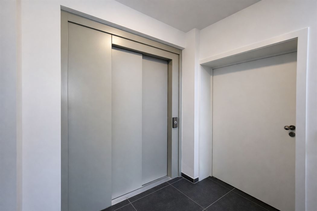Prachtig luxueus appartement met terras, ondergrondse garage en hoogwaardige technieken op topligging nabij het centrum van Genk