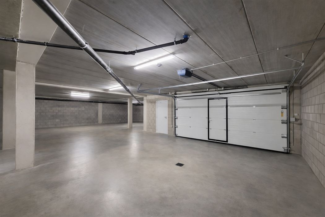Prachtig luxueus appartement met terras, ondergrondse garage en hoogwaardige technieken op topligging nabij het centrum van Genk