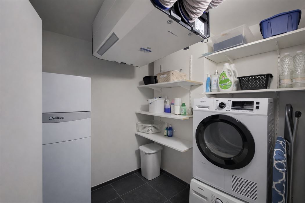 Prachtig luxueus appartement met terras, ondergrondse garage en hoogwaardige technieken op topligging nabij het centrum van Genk