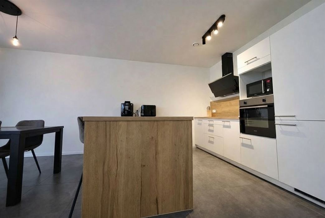 Prachtig luxueus appartement met terras, ondergrondse garage en hoogwaardige technieken op topligging nabij het centrum van Genk