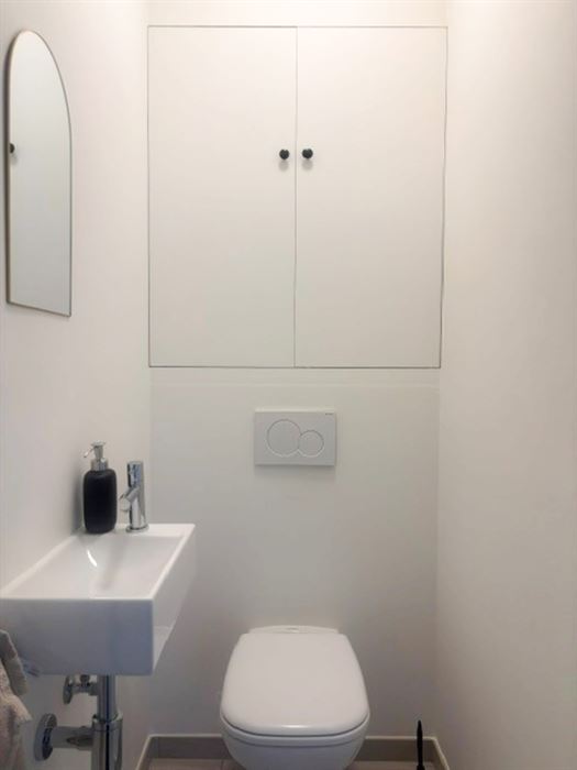 Instapklare, energiezuinige starterswoning met 2 slaapkamers, tuintje en ondergrondse parking op toplocatie in Maasmechelen!