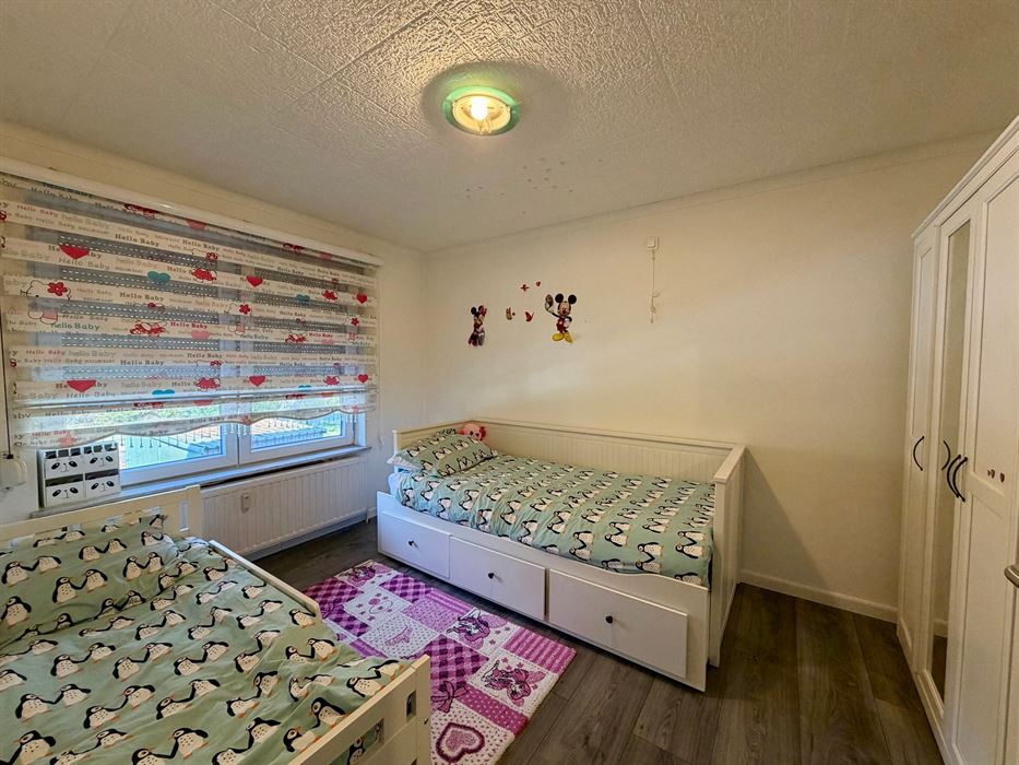 Ruim gelijkvloers appartement met 3 slaapkamers.