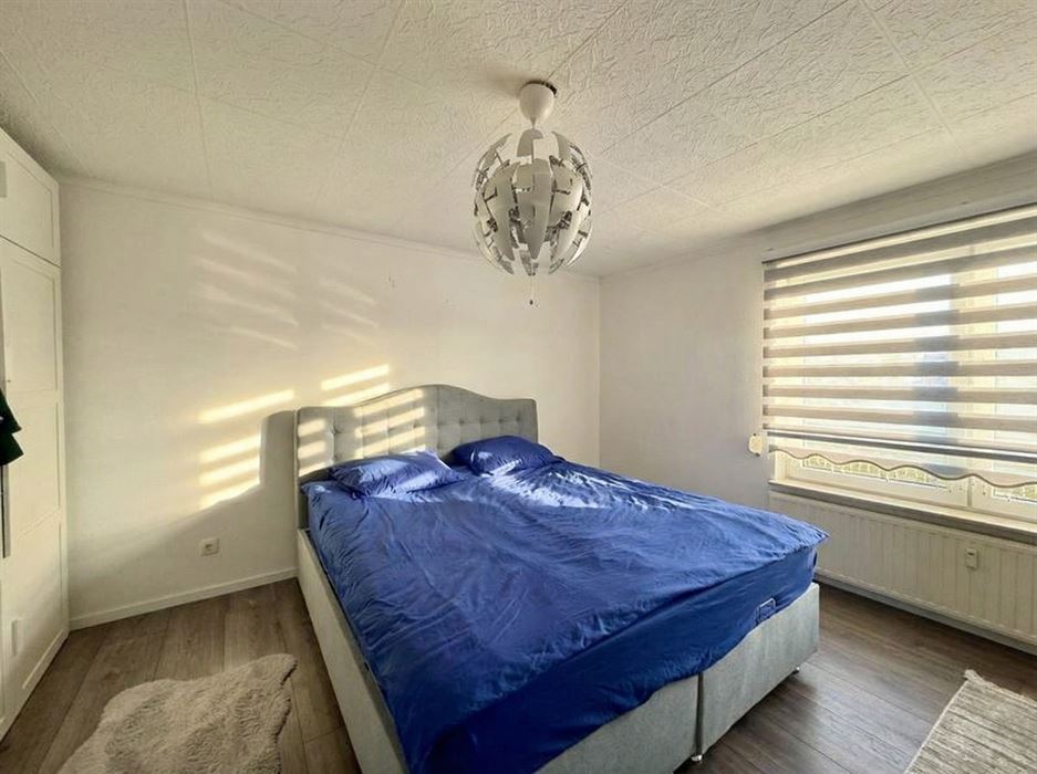 Ruim gelijkvloers appartement met 3 slaapkamers.