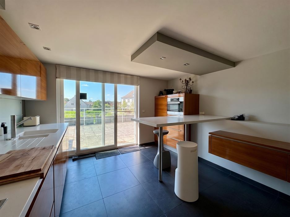 Ruim wonen op een toplocatie in Lanklaar met alle comfort, 2 terrassen en garagebox inbegrepen.