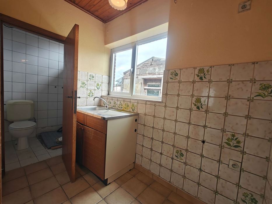 Te renoveren mijnwerkerswoning met 4 slaapkamers en extra kangoeroegedeelte
