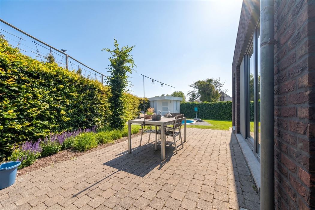 Instapklare halfopen woning met 3 slaapkamers en zwembad te Bilzen