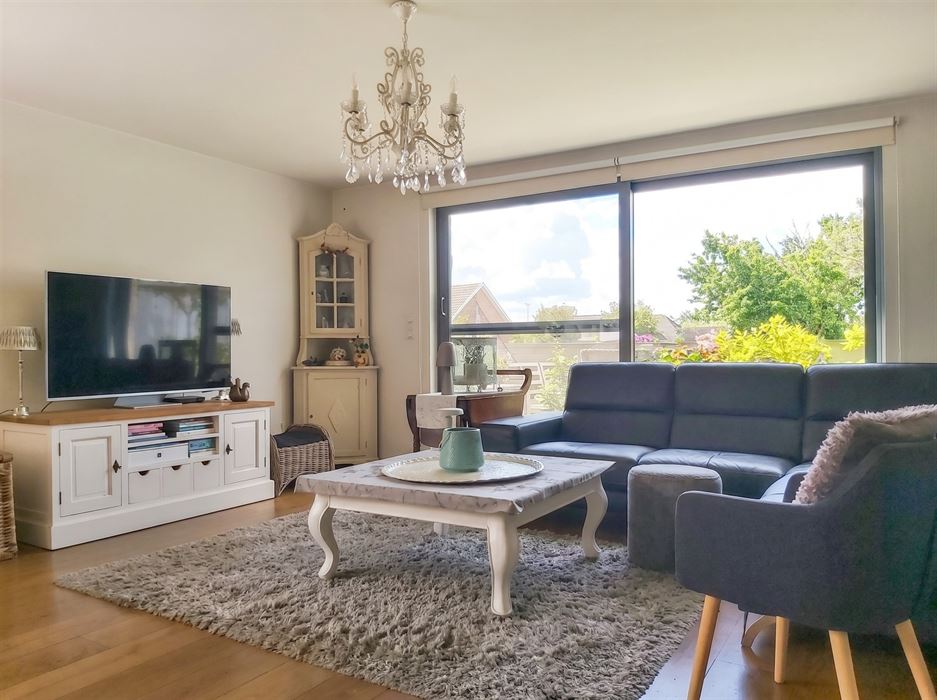 Instapklaar duplexappartement met inpandige garage, zuidgericht terras en 2 slaapkamers op mooie locatie in Maasmechelen!