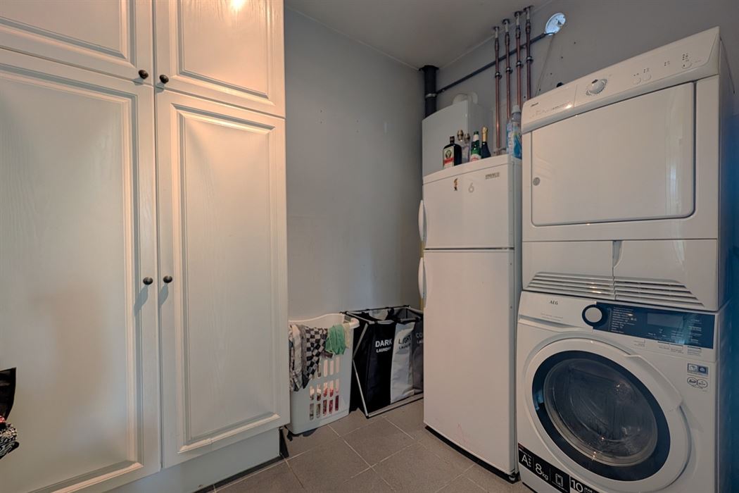 Instapklare halfopen woning met 3 slaapkamers en zwembad te Bilzen
