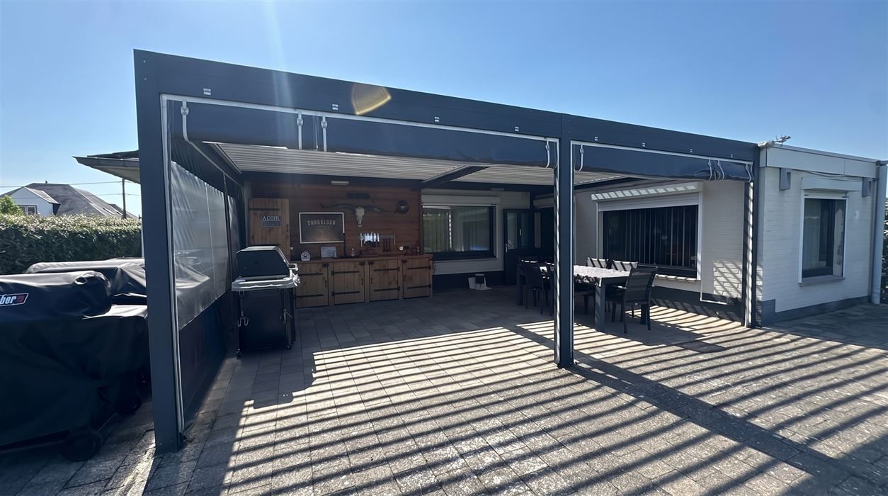 Vrijstaande gelijkvloerse woning op een perceel van 18a30ca.