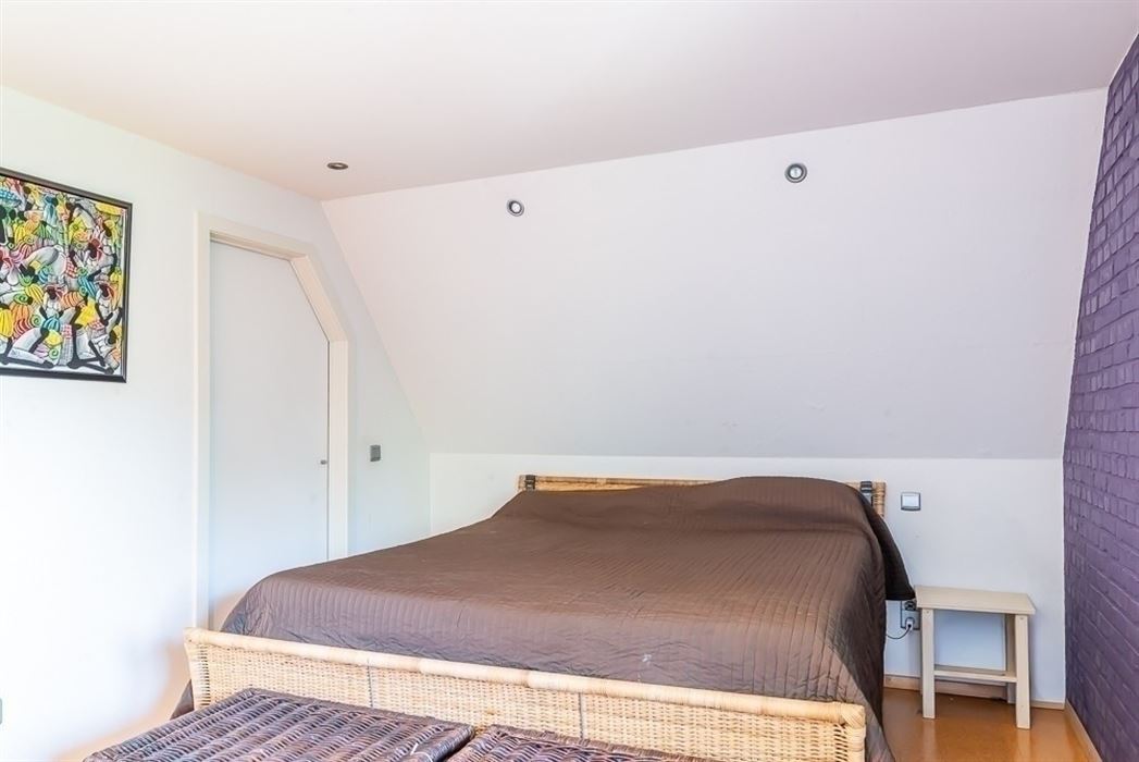 Karakteristiek handelshuis met ruime bovenwoning op toplocatie nabij Maasmechelen