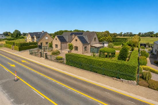 Ruime woning op een perceel van 20a!