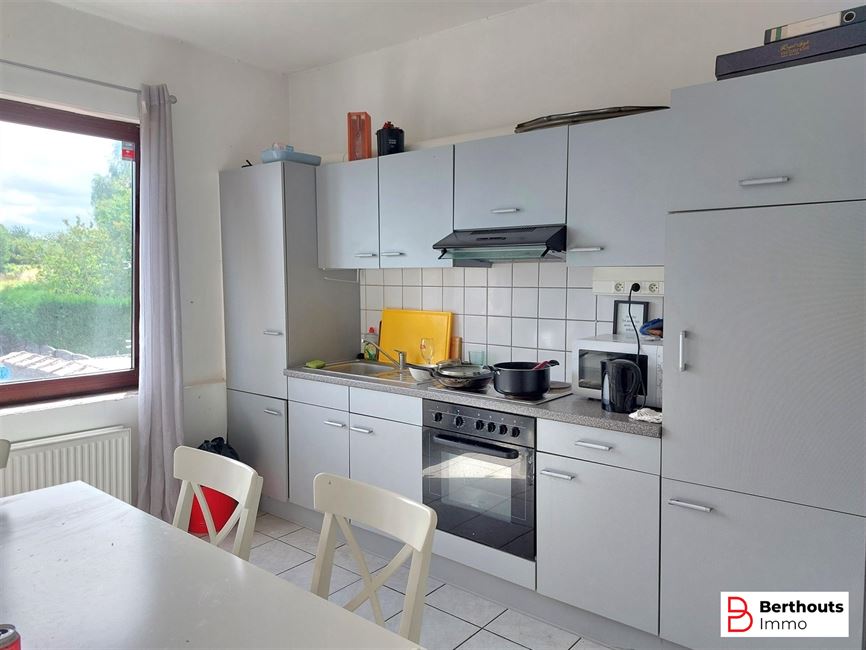 Immeuble polyvalent avec espace commercial et  duplex