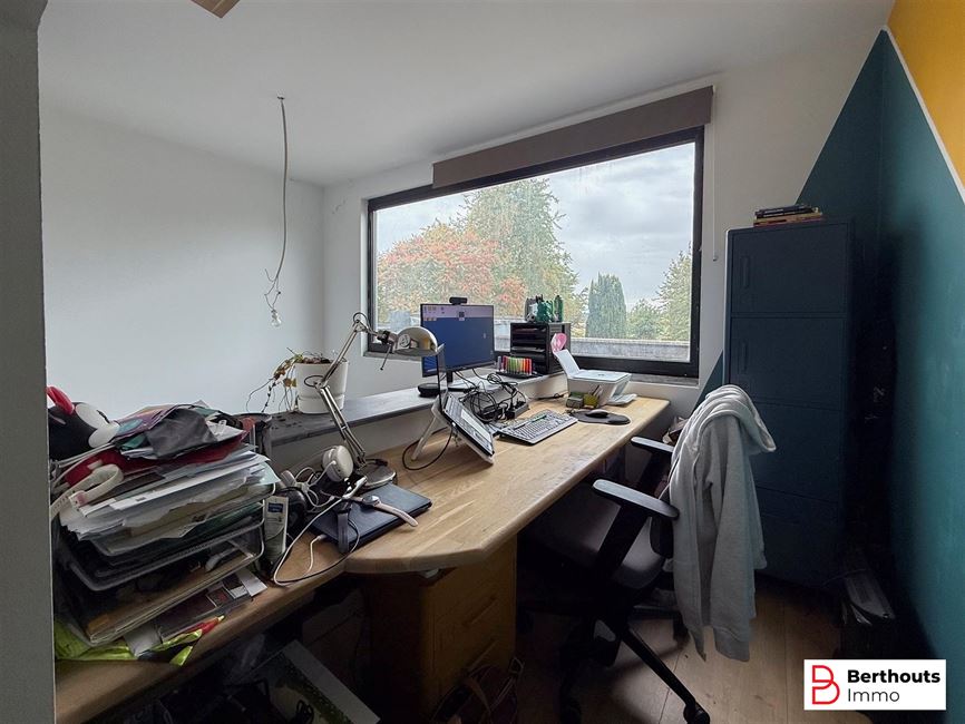 GERENOVEERDE RIJWONING MET TUIN