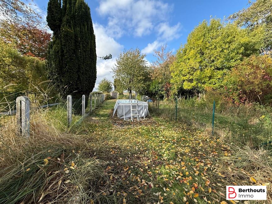 GERENOVEERDE RIJWONING MET TUIN
