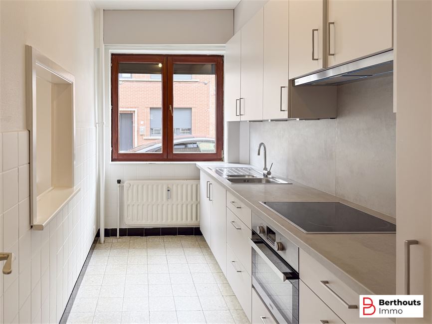 Gelijksvloersppartement met 2 slaapkamers - kelder - garage
