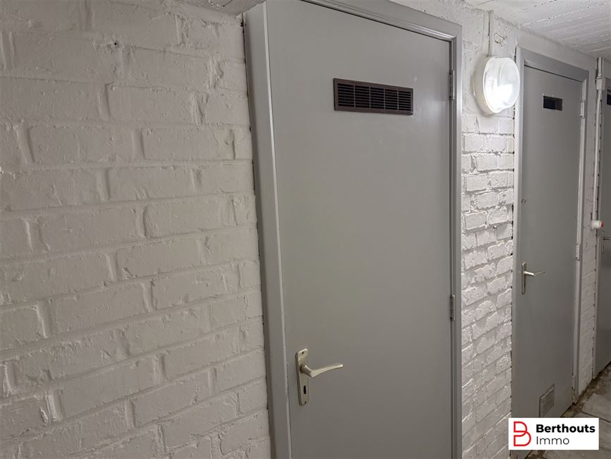 Gelijksvloersppartement met 2 slaapkamers - kelder - garage