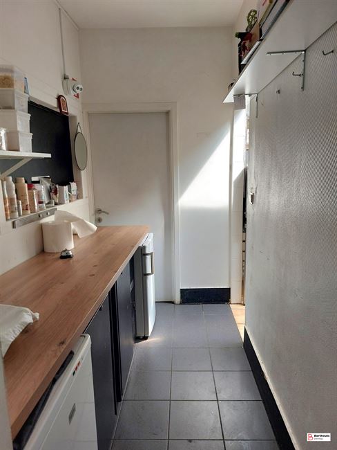 Veelzijdig opbrengstpand met handelsruimte en duplex