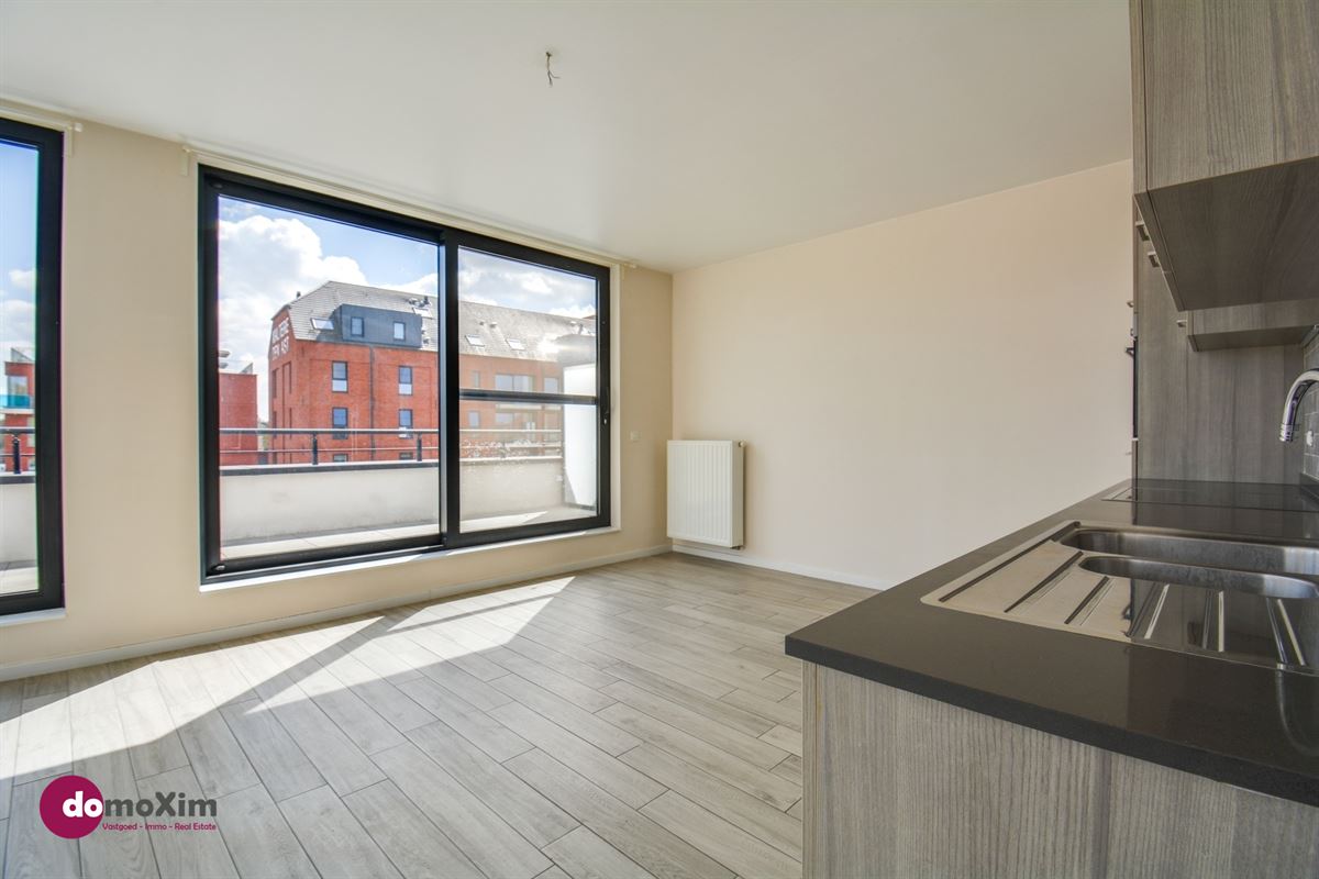 Appartement lumineux avec 2 chambres et une grande terrasse au cœur de Boortmeerbeek