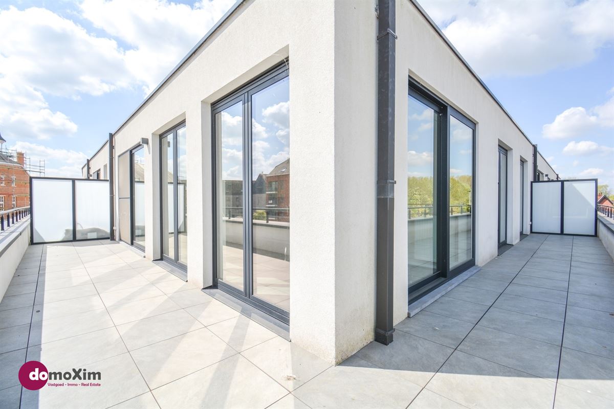 Appartement lumineux avec 2 chambres et une grande terrasse au cœur de Boortmeerbeek