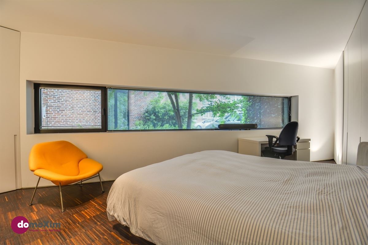 Architecturale woning met parking in het hart van Leuven