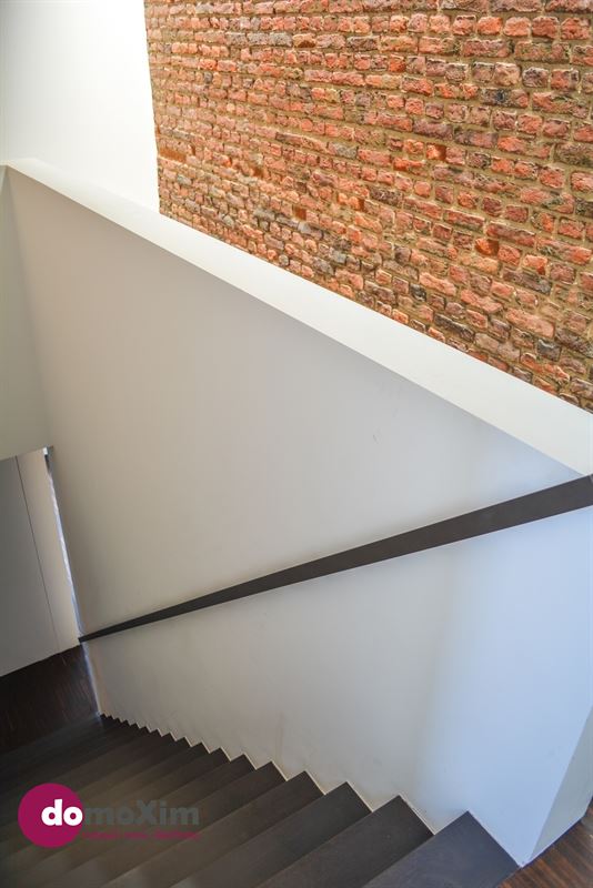 Architecturale woning met parking in het hart van Leuven