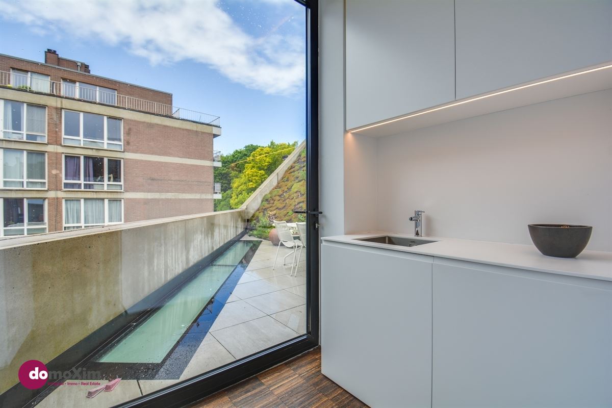 Architecturale woning met parking in het hart van Leuven