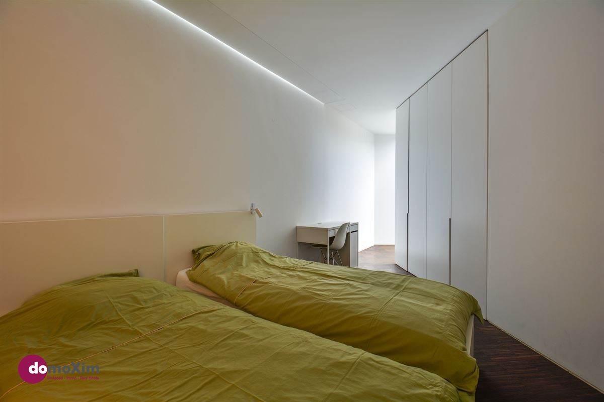 Architecturale woning met parking in het hart van Leuven