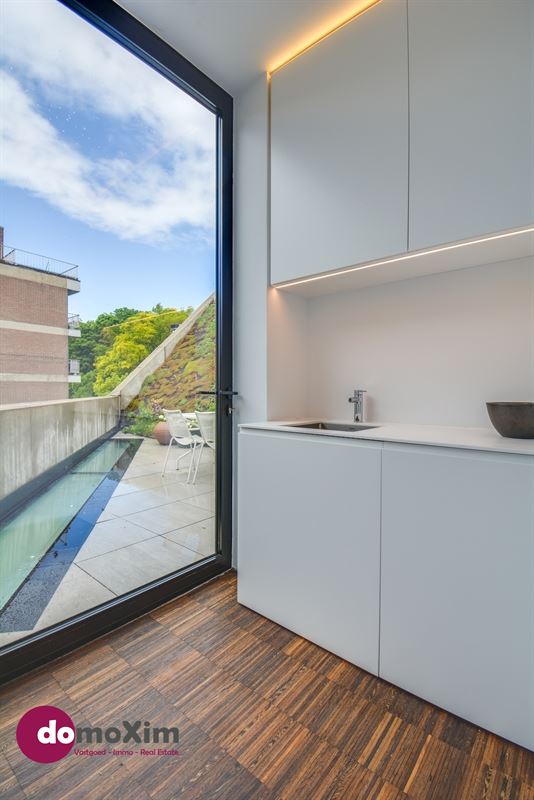 Architecturale woning met parking in het hart van Leuven
