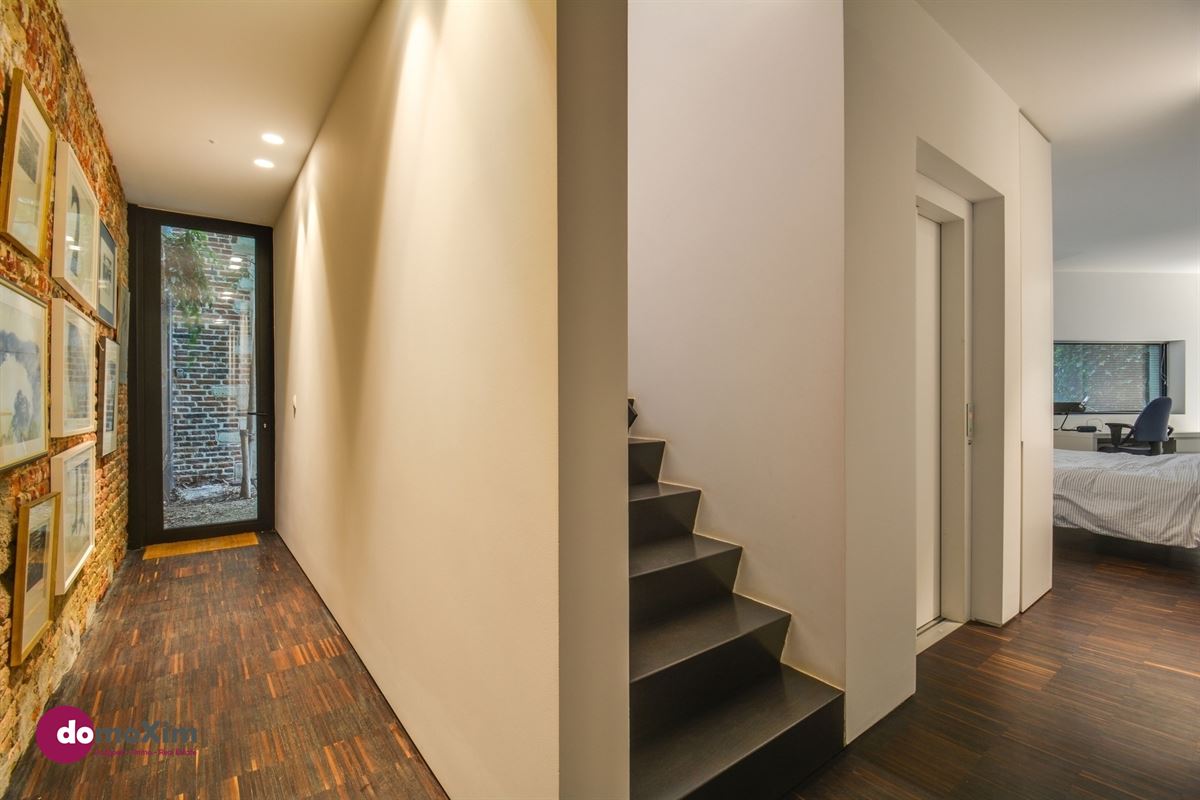 Architecturale woning met parking in het hart van Leuven