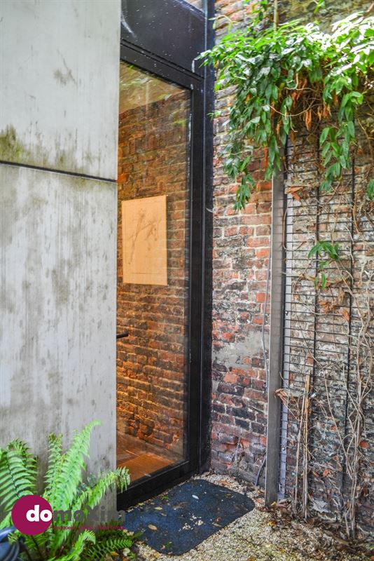 Architecturale woning met parking in het hart van Leuven