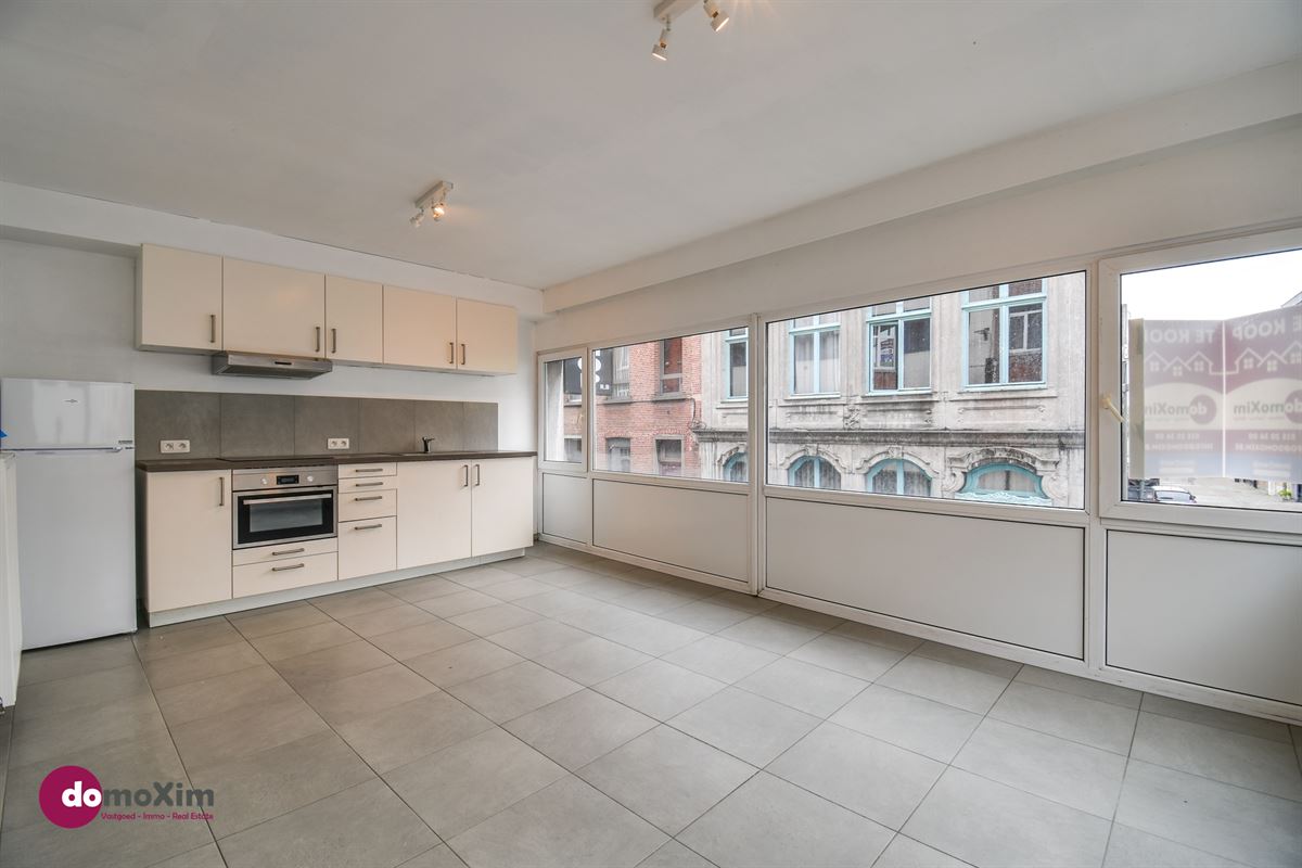 Investment property with 3 apartments and commercial space in downtown Mechelen