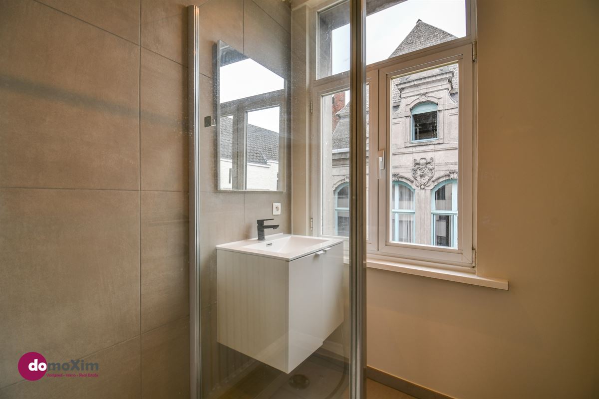 Investment property with 3 apartments and commercial space in downtown Mechelen