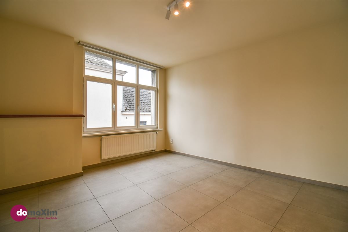 Investment property with 3 apartments and commercial space in downtown Mechelen