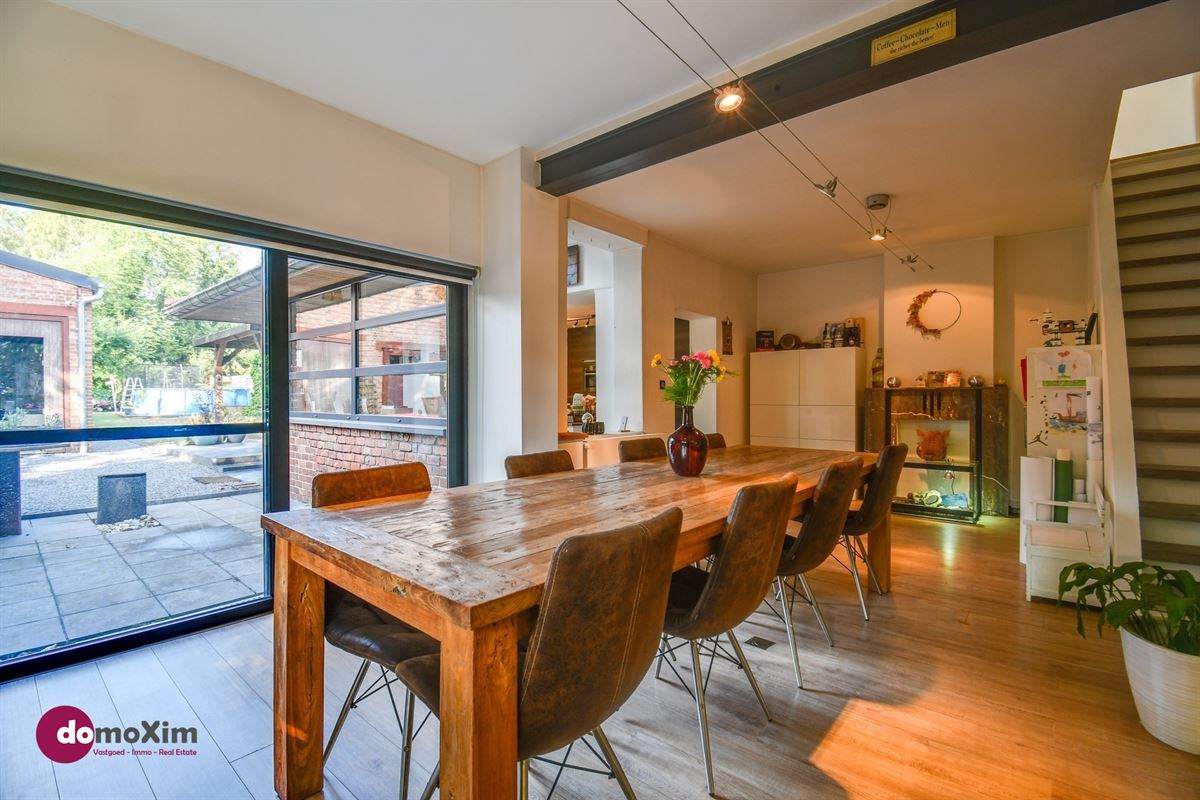 Instapklare woning met ruime hangar nabij het centrum van Hever