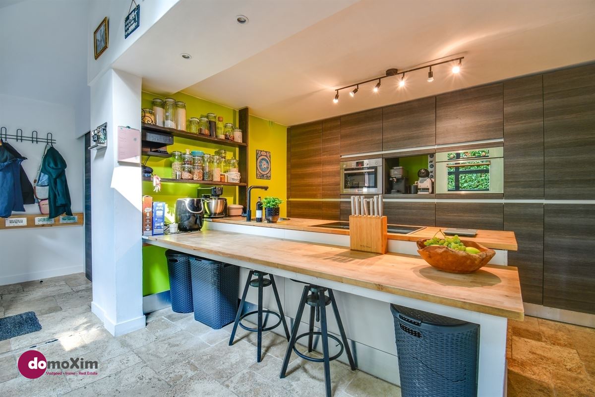 Instapklare woning met ruime hangar nabij het centrum van Hever