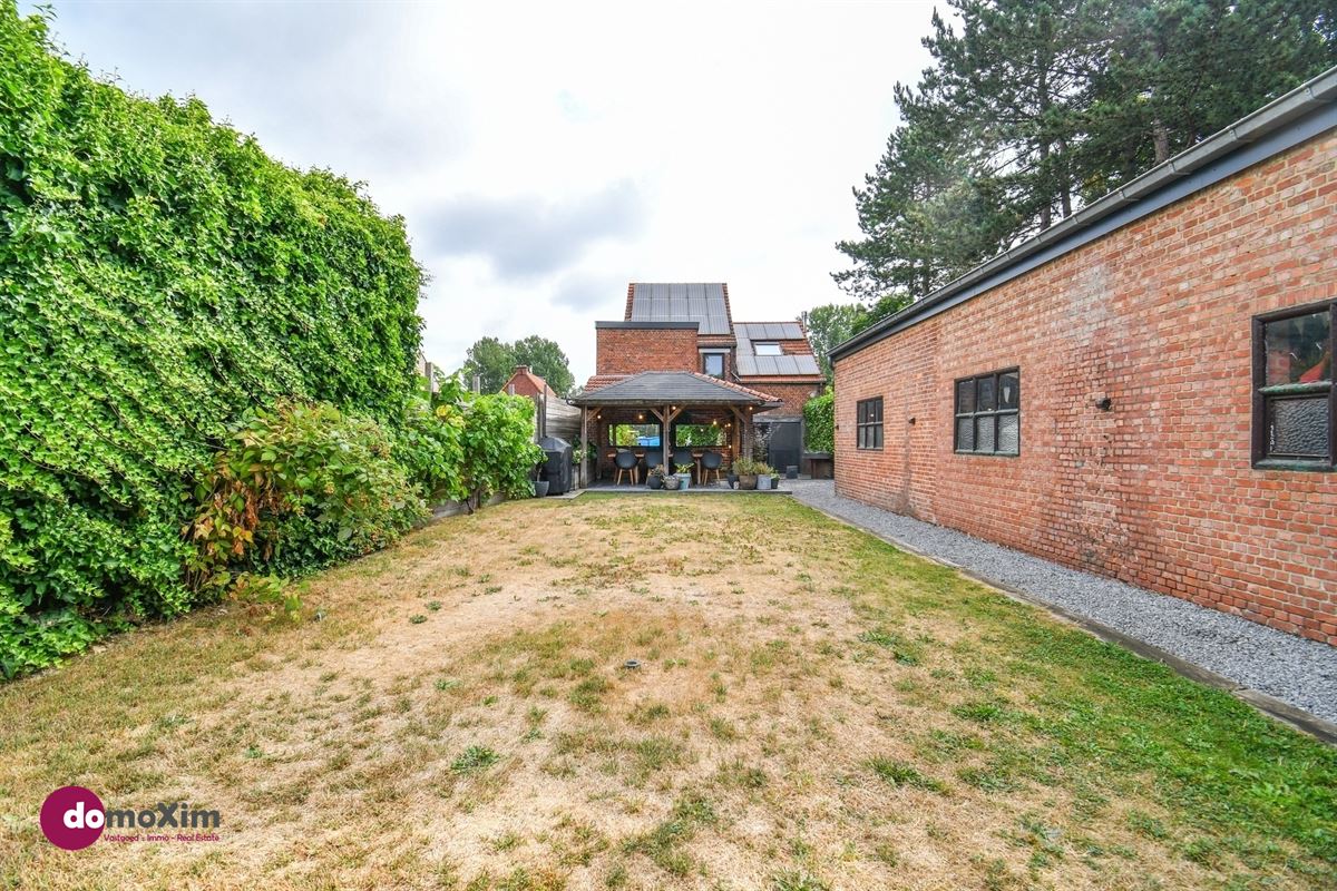 Instapklare woning met ruime hangar nabij het centrum van Hever