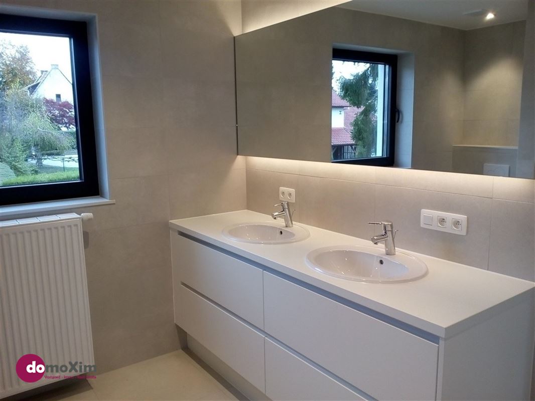 Modern 2-bedroom home with a spacious yard located in a residential neighborhood in Tervuren
