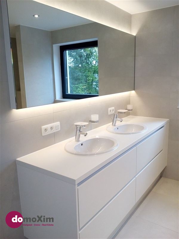 Modern 2-bedroom home with a spacious yard located in a residential neighborhood in Tervuren