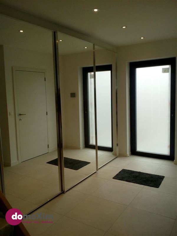 Modern 2-bedroom home with a spacious yard located in a residential neighborhood in Tervuren