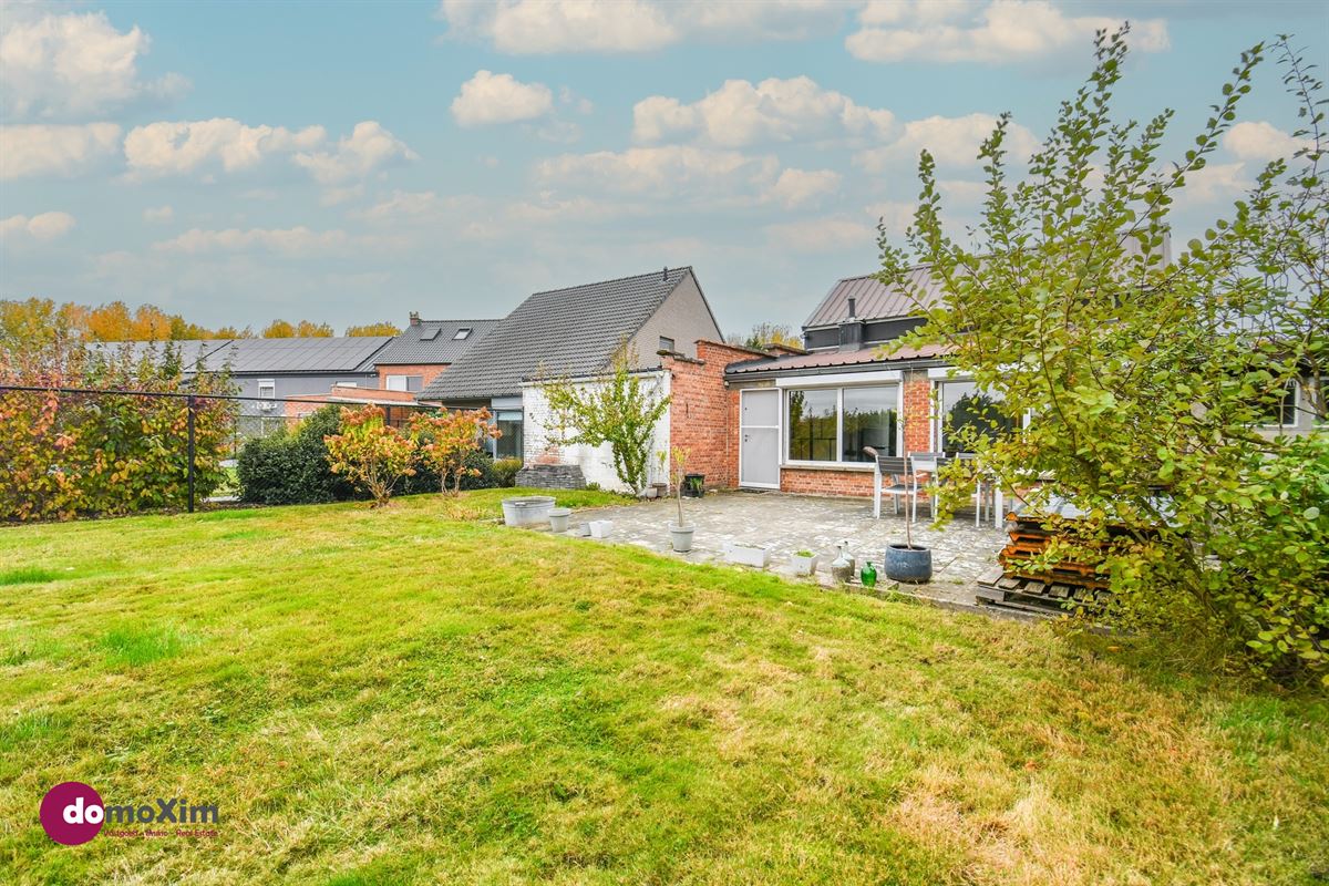 Maison à fort potentiel et magnifique jardin avec vue sur la verdure à Boortmeerbeek