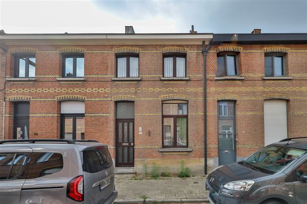 Te renoveren woning met grote tuin in Mortsel!