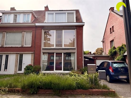 Gelijkvloers appartement met grote tuin!
