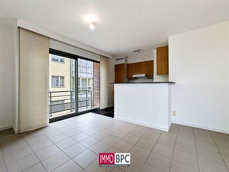 Superbe appartement moderne de 1 chambre avec terrasse, parking intérieur et cave - IMMO BPC