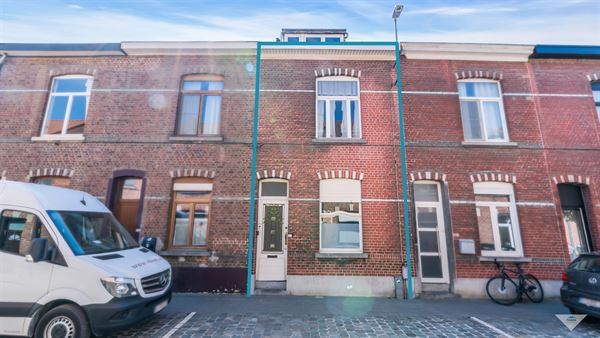 Te renoveren rijwoning met 3 slaapkamers op topligging