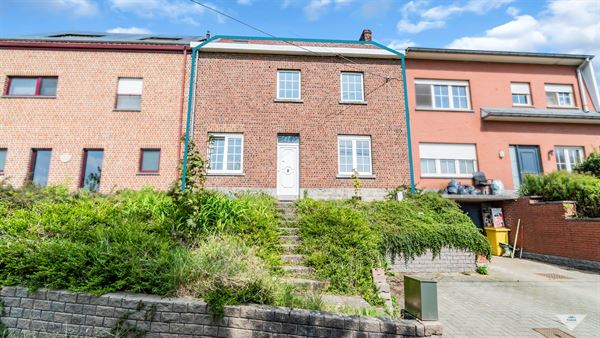 Te renoveren woning met veel potentieel in Korbeek-Dijle