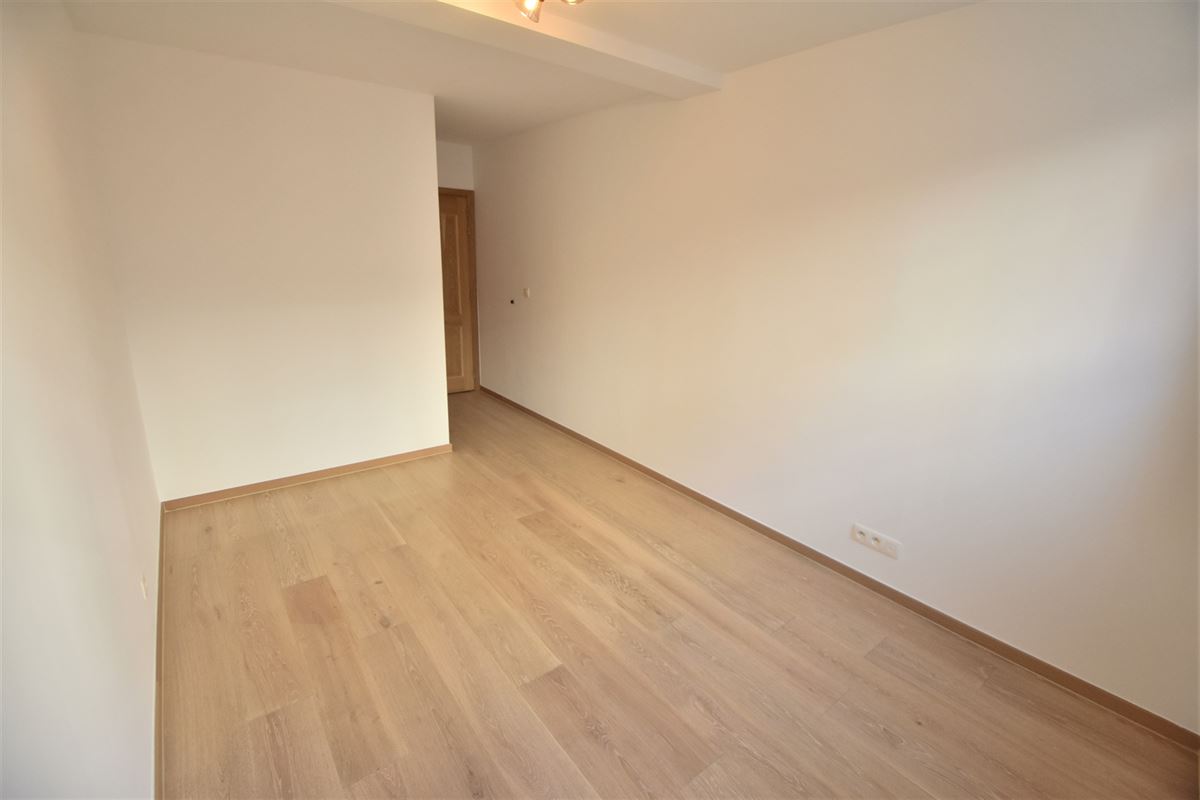 Appartement 2ch. + 2 parkings en plein centre !