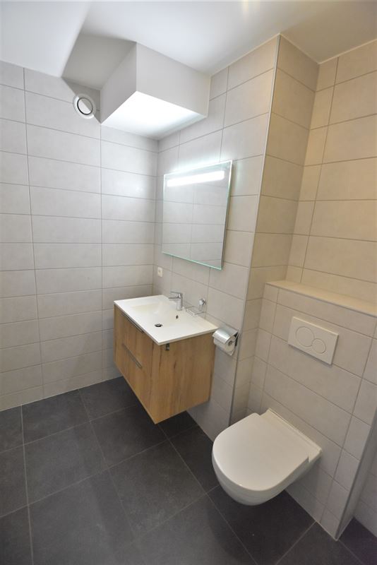 Appartement 2ch. + 2 parkings en plein centre !